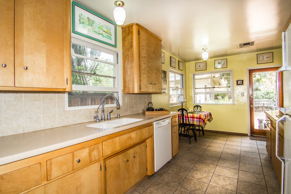The Kitchen features updated counters and beautiful cabinetry.